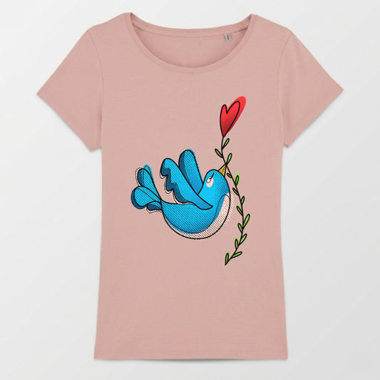 Blue bird with a heart-shaped balloon on a branch, graphic print on pink t-shirt.