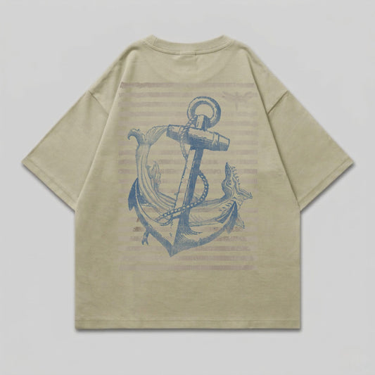 Beige t-shirt with blue anchor and striped design on back.