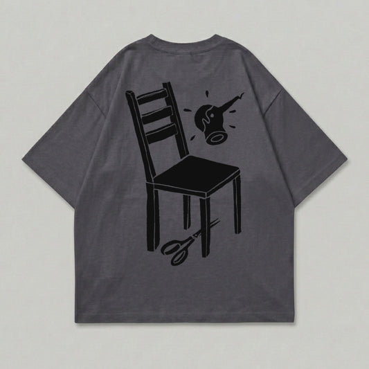 Charcoal Chair Scissors Explosion Graphic T-Shirt product type
Graphic Tee
Charcoal Shirt
Dark Grey Top
Abstract Design
Chair Graphic
Scissors Art
Splash Print
Unique Apparel
Streetwear Style
Casual Fashion
Back Print Tee
Oversized Fit
Minimalist Art
Surreal Graphic
Unisex Tee
Modern Design
Black Print
Comfortable Top
Statement Piece
Contemporary Art