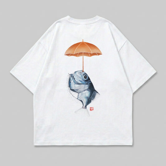 White t-shirt with illustration of fish holding an umbrella.