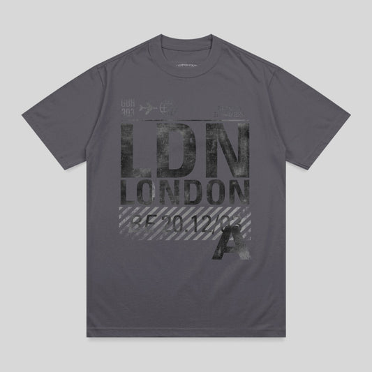 Gray t-shirt with "LDN LONDON" text and airport-style markings.
