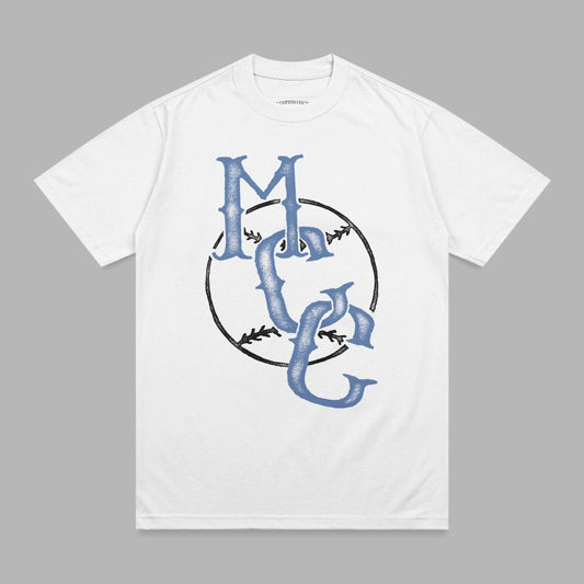 White t-shirt with blue "MC" logo featuring baseball stitching.