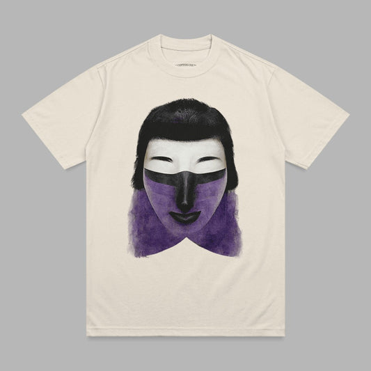 Cream t-shirt with abstract purple and black face mask graphic.