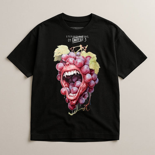 Black t-shirt with a graphic of a cluster of grapes with a mouth and teeth.