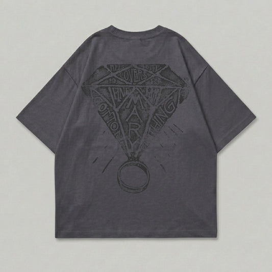 Dark grey t-shirt with diamond graphic and ring on back.