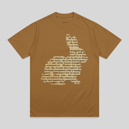 Brown t-shirt with a silhouette of a rabbit and OCR text about interrogation.