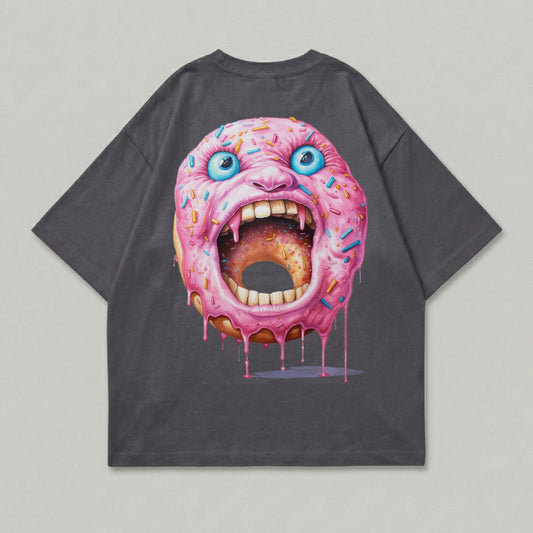 T-shirt with a cartoon donut monster graphic.
