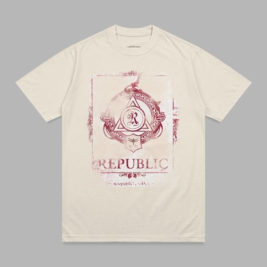 Cream t-shirt with distressed red "REPUBLIC" graphic and circular emblem.
