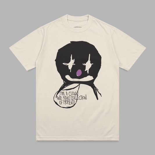 Cream t-shirt with black clown graphic and text "I AM A CLOWN AND MAKE COLLECTION OF MOMENTS".