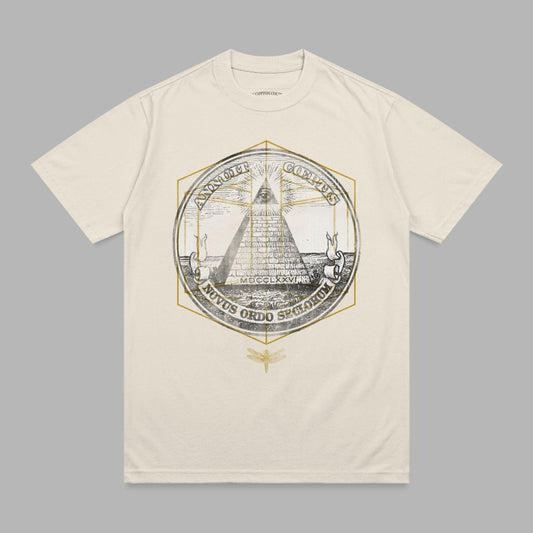 Cream t-shirt with an all-seeing eye pyramid emblem and "Novus Ordo Seclorum" text.