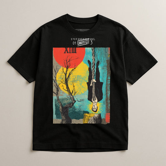 Black t-shirt with abstract art of man hanging from rope, tree, and geometric shapes.