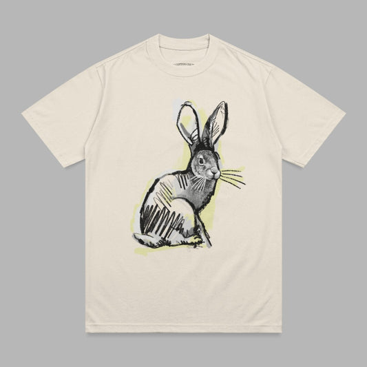 Cream t-shirt with a sketched rabbit illustration.