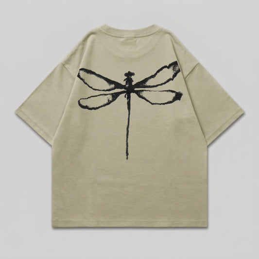 Tan t-shirt with a black dragonfly graphic on the back.