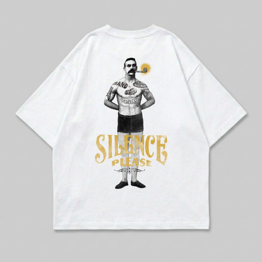 White t-shirt featuring a tattooed man smoking a pipe and "SILENCE PLEASE" text.