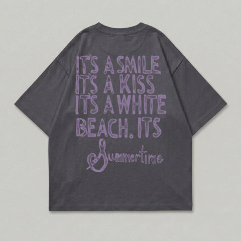 Dark grey t-shirt with "It's a smile, it's a kiss, it's a white beach. Summertime" text.
