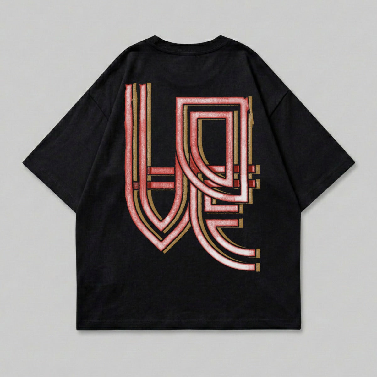 Black t-shirt with red and gold abstract lettering on the back.
