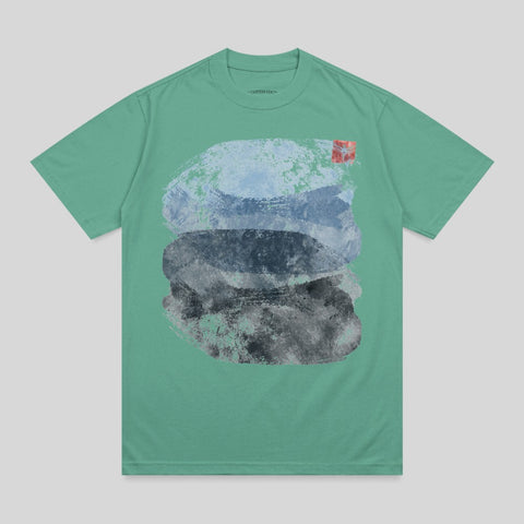 Green t-shirt with abstract blue, gray, and black watercolor brushstrokes.