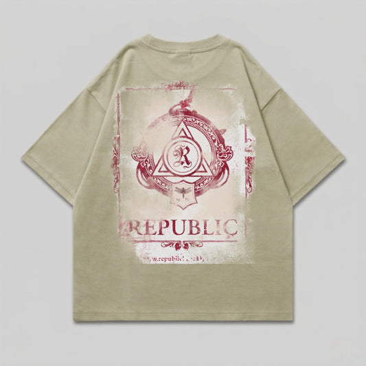 Distressed t-shirt with circular emblem featuring "REPUBLIC" text.