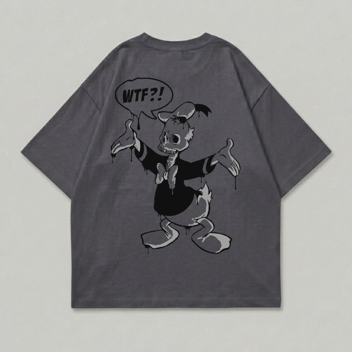 Dark t-shirt featuring a zombie-like cartoon duck character with "WTF?!" in a speech bubble.