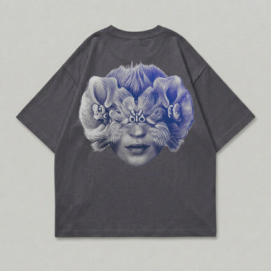 Dark gray t-shirt with abstract blue floral face graphic on the back.