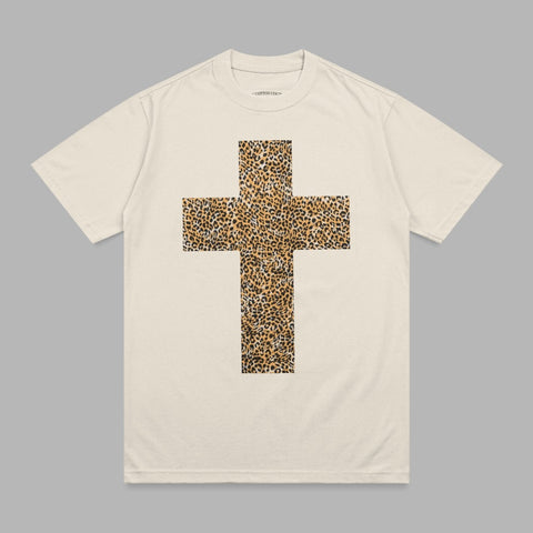 Cream t-shirt with a large leopard print cross graphic on the front.