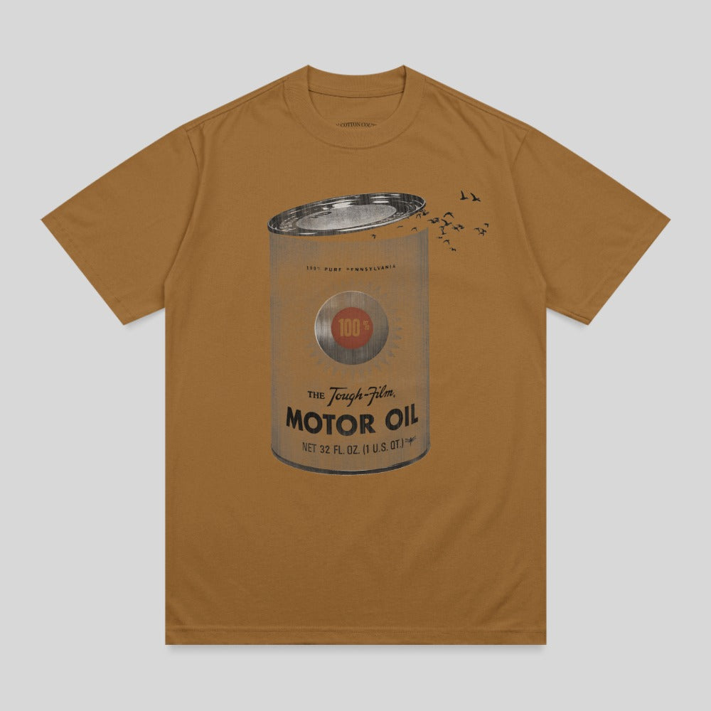 Brown t-shirt featuring a vintage motor oil can design with birds overhead.