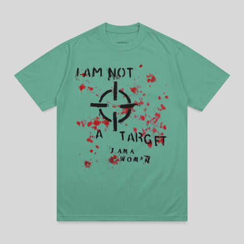Green t-shirt with a target graphic and "I AM NOT A TARGET. I AM A WOMAN." text.