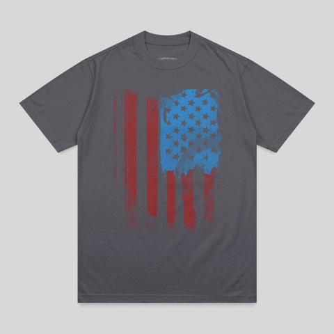 Gray t-shirt with a distressed American flag graphic in red and blue.