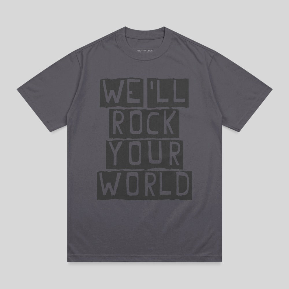 Dark gray t-shirt with bold black text "WE'LL ROCK YOUR WORLD".