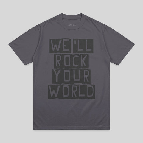 Dark gray t-shirt with bold black text "WE'LL ROCK YOUR WORLD".