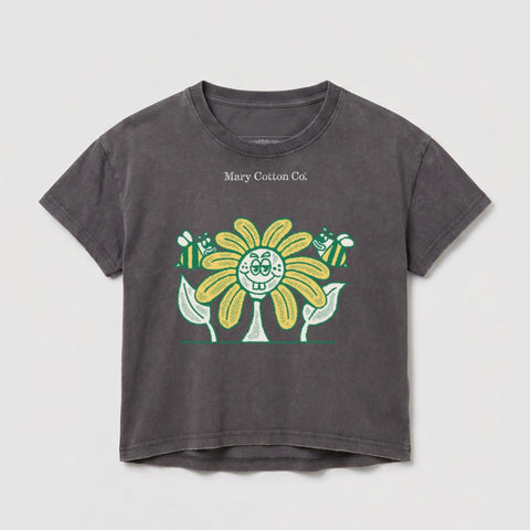 Dark grey t-shirt with a yellow cartoon flower and two bees.