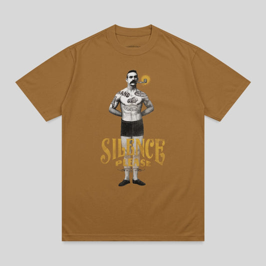 Man with pipe and band t-shirt with "SILENCE PLEASE" text.