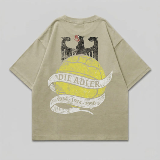 T-shirt with eagle graphic and yellow banner reading "DIE ADLER 1954-1974-1990".