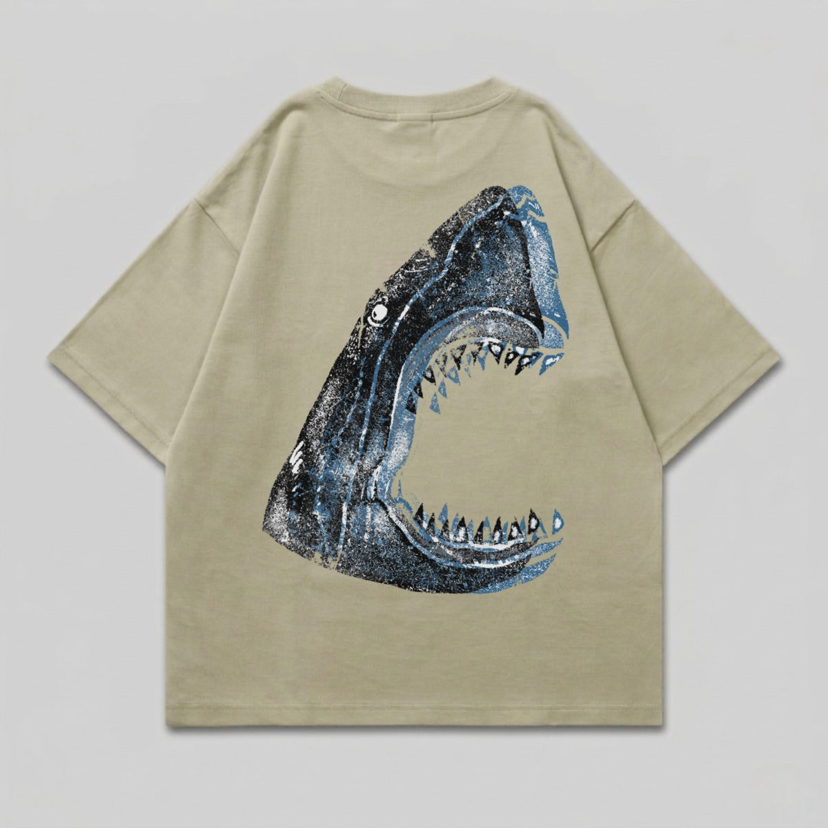 T-shirt with a distressed shark head graphic on the back.