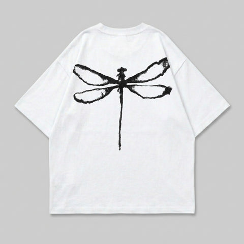 White t-shirt with a black dragonfly graphic on the back.