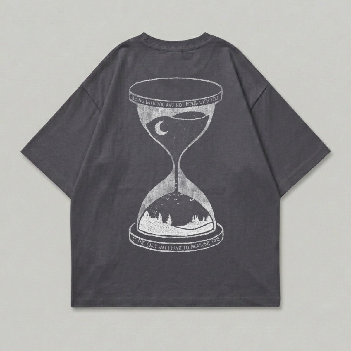 Dark gray t-shirt with hourglass graphic and text: "Being with you and not being with you is the only way I have to measure time."