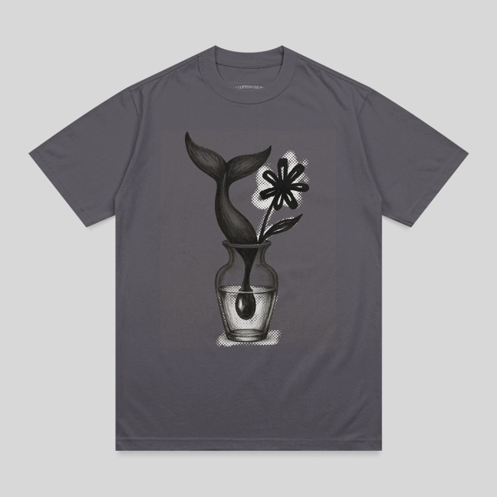 Gray t-shirt featuring a drawing of a whale's tail and flower in a vase.