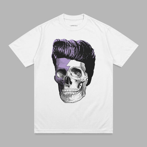 White t-shirt with a skull graphic featuring purple hair and a lightning bolt.