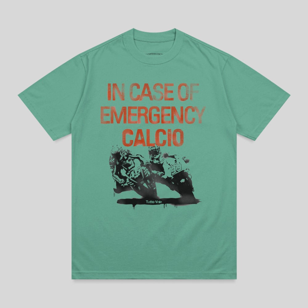 Green t-shirt with "IN CASE OF EMERGENCY CALCIO" and motorcycle graphic.