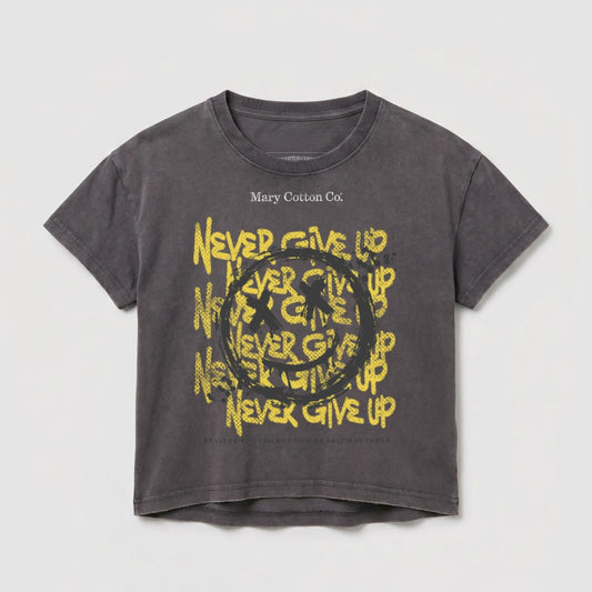 Gray t-shirt with "Never Give Up" slogan and smiley face graphic.