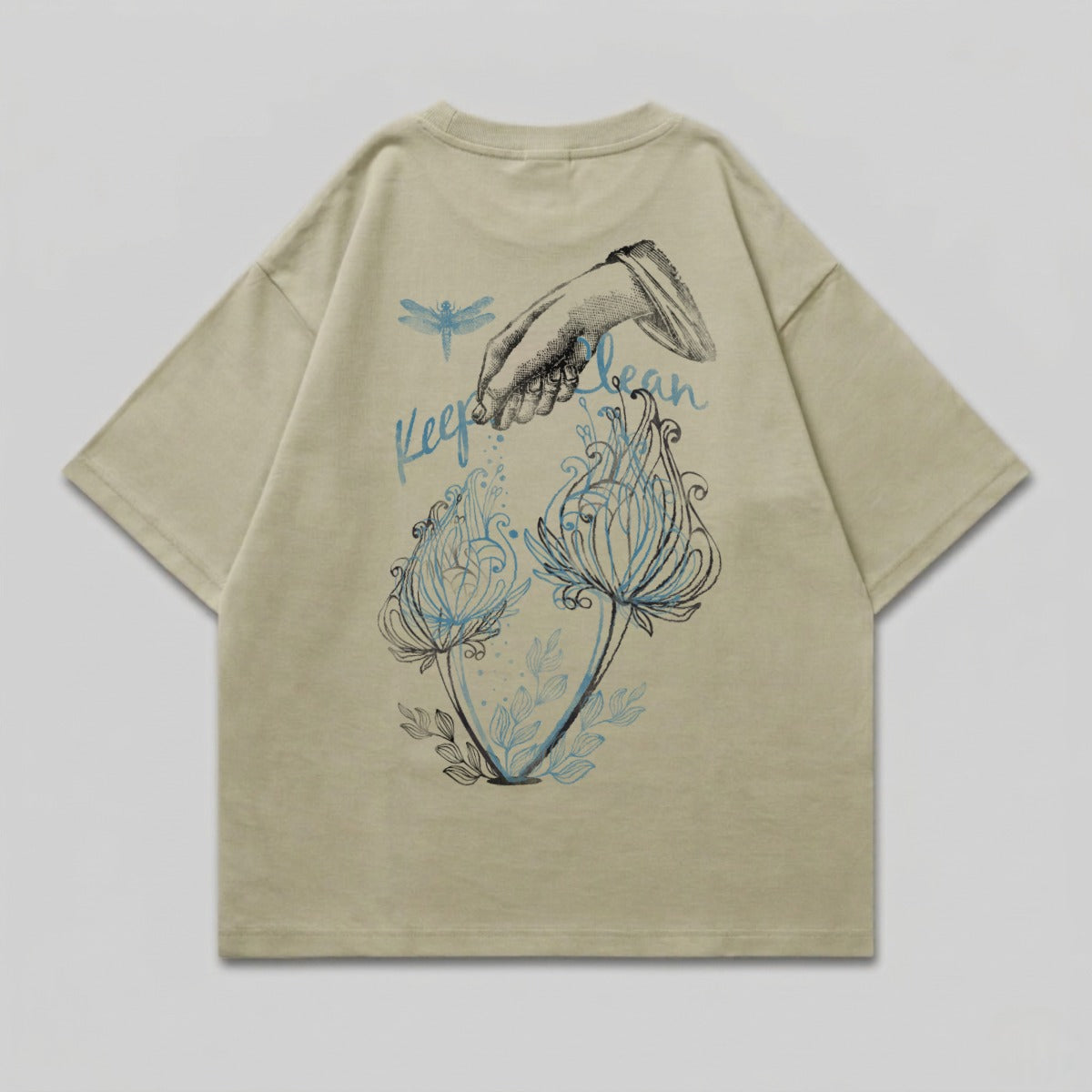 Light tan t-shirt with dragonfly and floral design.