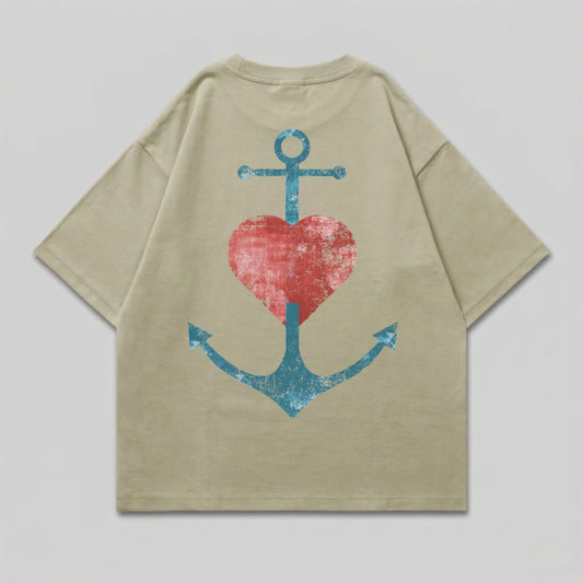 Khaki t-shirt with distressed anchor and heart graphic on back.
