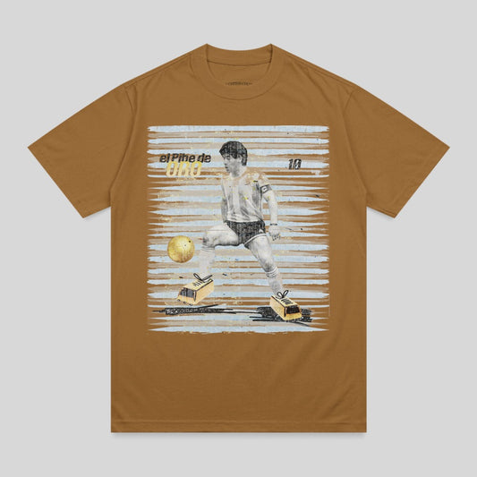 Brown t-shirt featuring Diego Maradona in action with soccer ball.