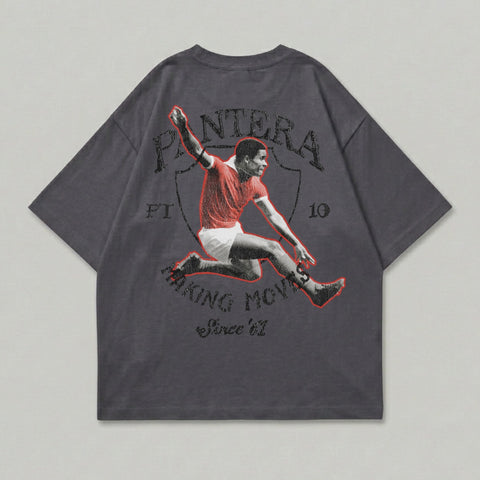 Dark grey t-shirt with vintage graphic of soccer player and "PANTERA" text.