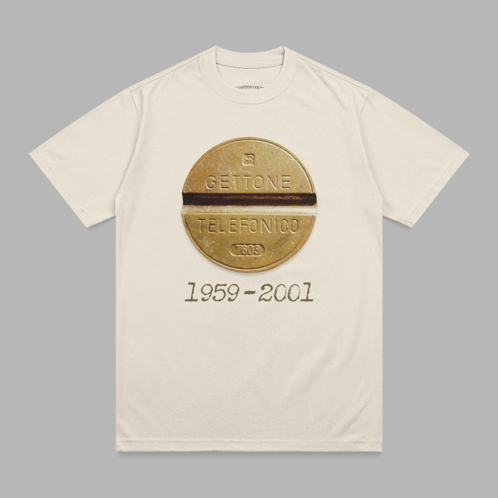 Cream t-shirt with gold circular emblem featuring "GETTONE TELEFONICO" and "1959-2001".