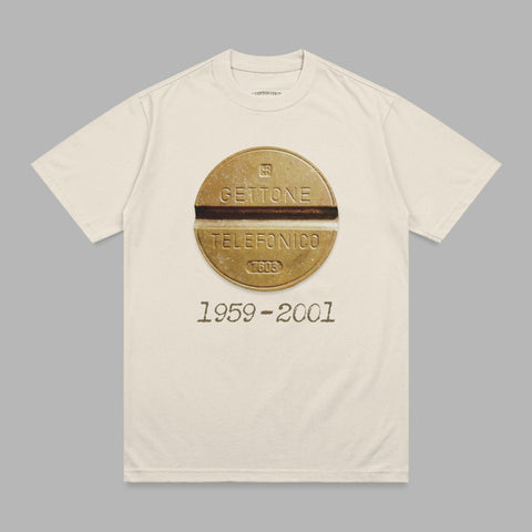 Cream t-shirt with gold circular emblem featuring "GETTONE TELEFONICO" and "1959-2001".