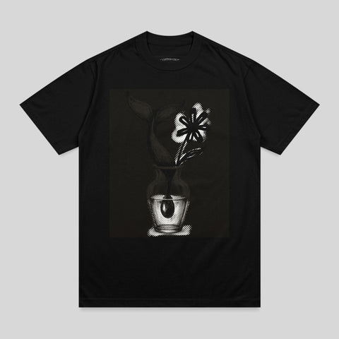 Black t-shirt with a white floral graphic in a vase.