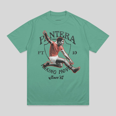 Green t-shirt with graphic of a leaping soccer player and "PANTERA" text.
