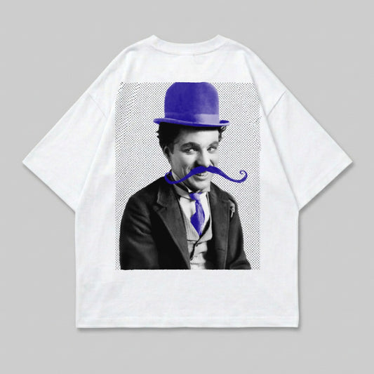 Charlie Chaplin wearing a blue bowler hat and mustache on a white t-shirt.