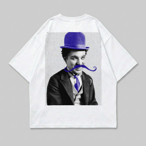 Charlie Chaplin wearing a blue bowler hat and mustache on a white t-shirt.